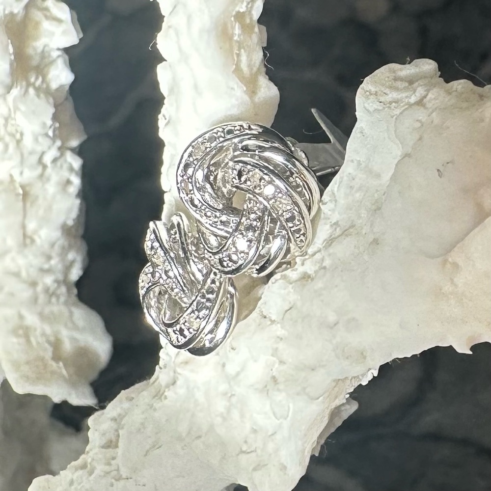 Macy's
Diamond Love Knot Stud Earrings (1/10 ct. t.w.) in Sterling Silver